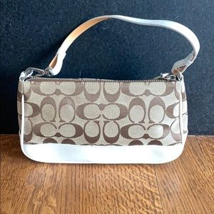 Small tan and white coach bag